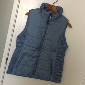 NWT. Lt blue Down vest. Feminine, fitted cut.